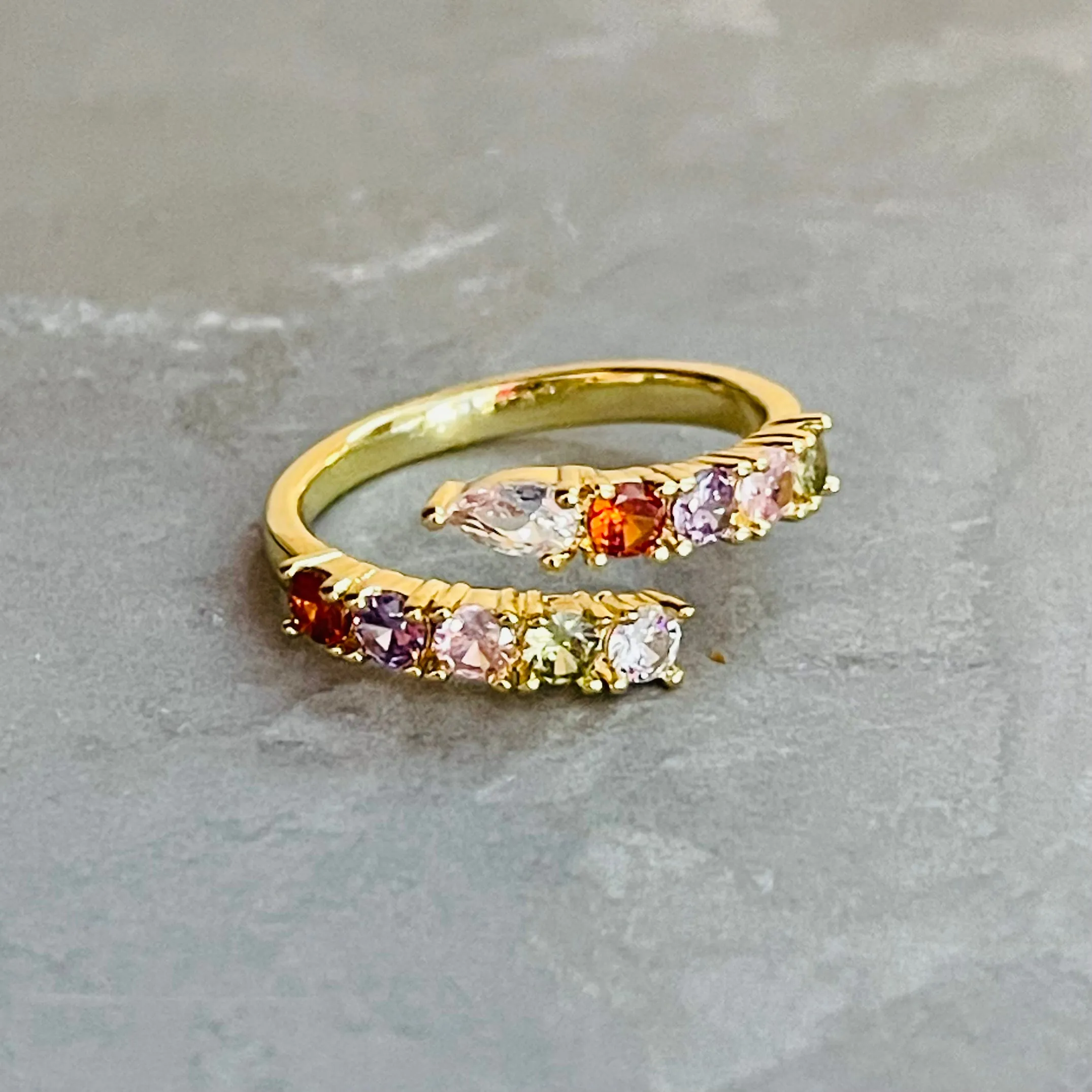 The Colorful Sparkling Gemstone Adjustable Ring is a vibrant