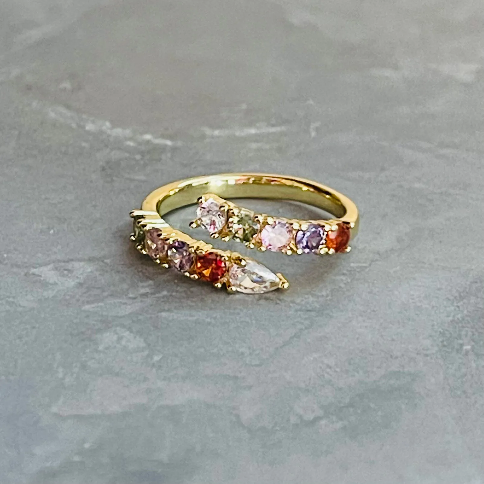 The Colorful Sparkling Gemstone Adjustable Ring is a vibrant