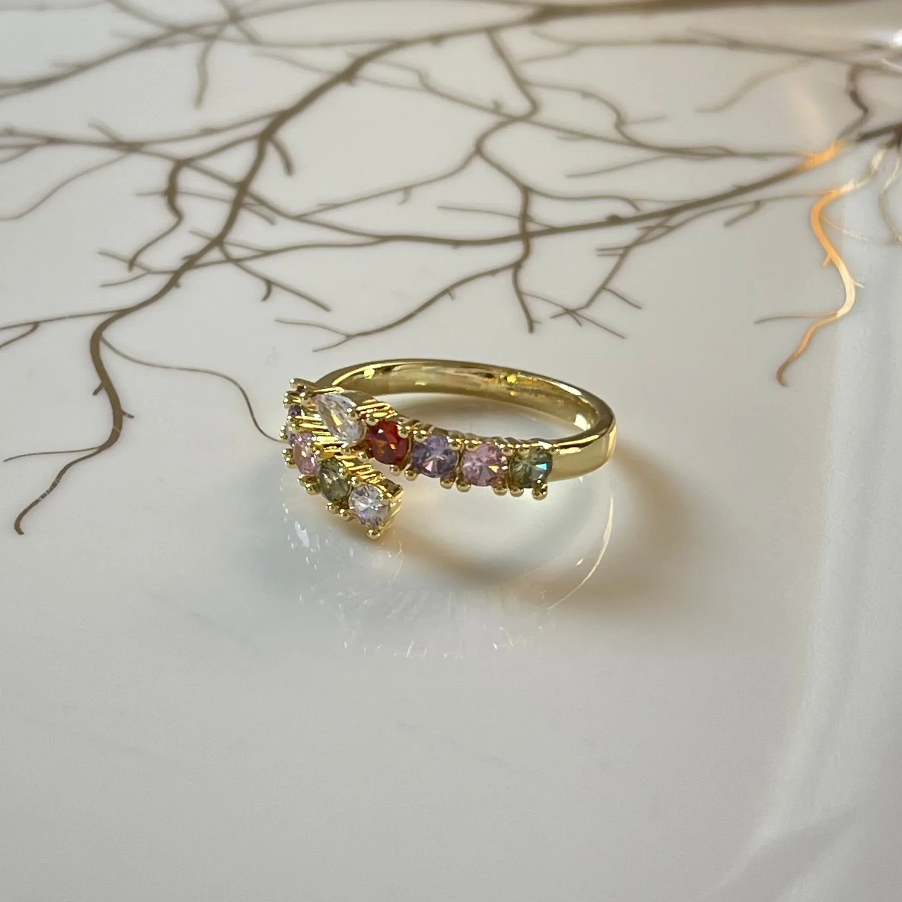 The Colorful Sparkling Gemstone Adjustable Ring is a vibrant