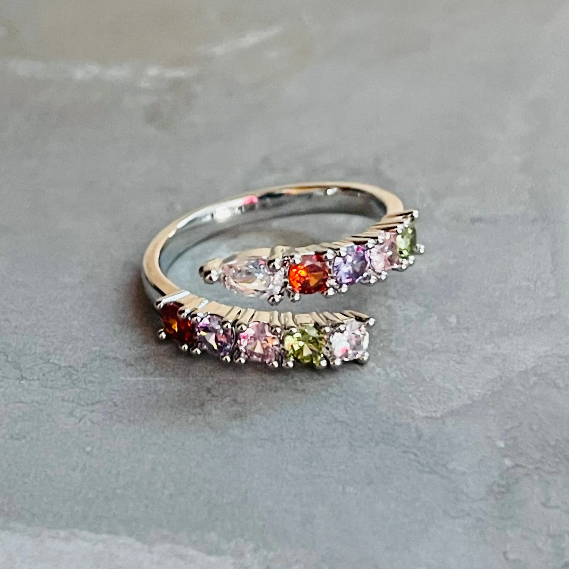 The Colorful Sparkling Gemstone Adjustable Ring is a vibrant